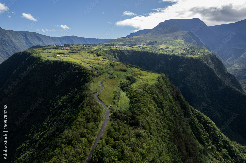 Aerial view of a road on mountain at Grand Coude (Saint-Joseph), Reunion Island - obrazy, fototapety, plakaty 