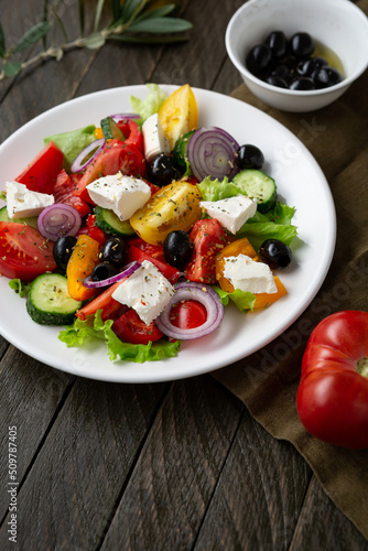 close up of Fresh Greek salad o white plate