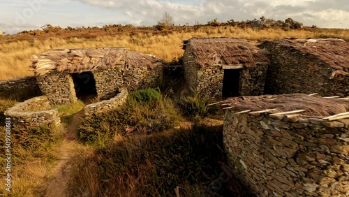 Castromao Celanova ancient cabins in Galicia Spain, aerial drone circle pan photo