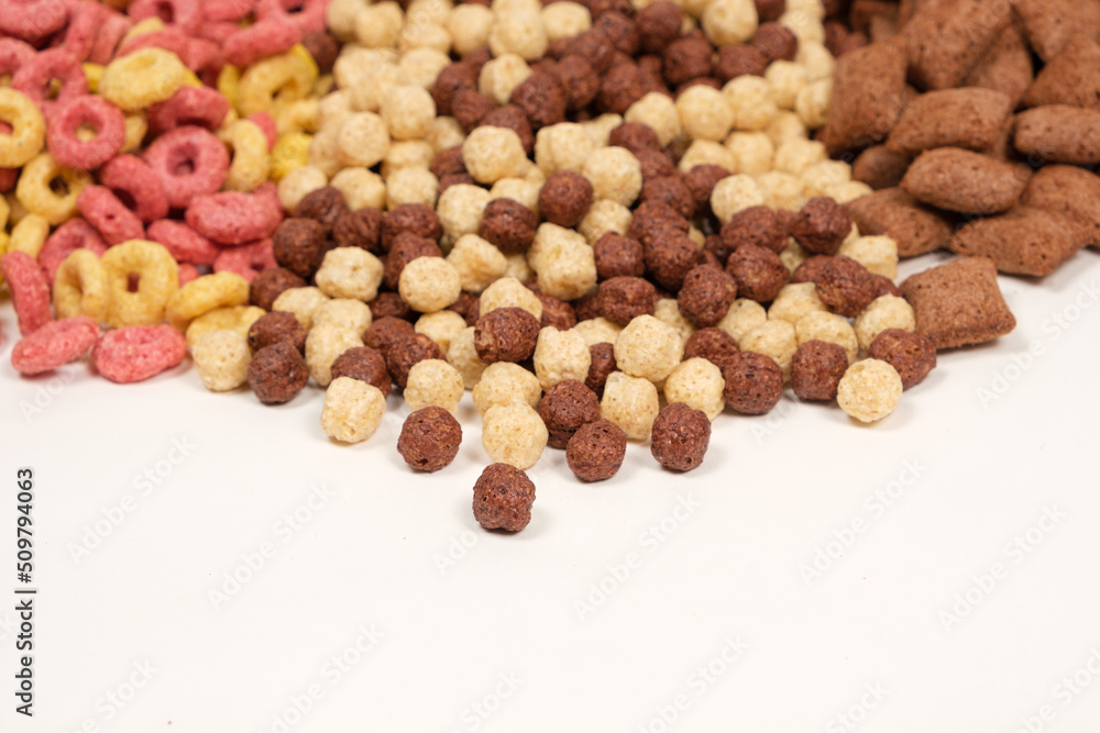 A set of different quick breakfast cereals - rings, balls and pads. A set of different quick breakfast cereals - rings, balls and pads.