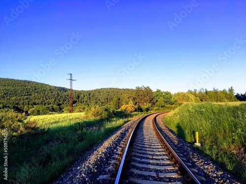 
Railway among forests and fields