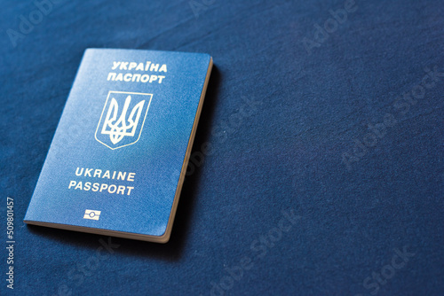 Ukrainian passport on a blue background