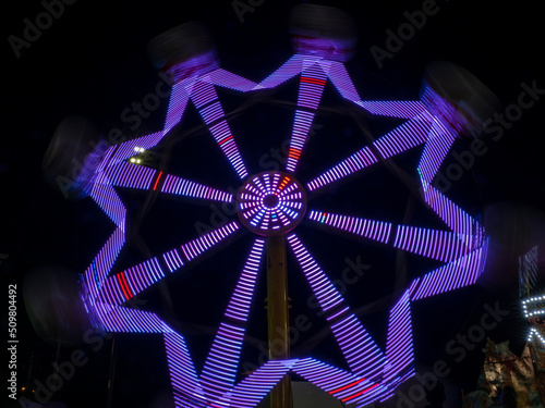 ferris wheel in motion, long exposure photo