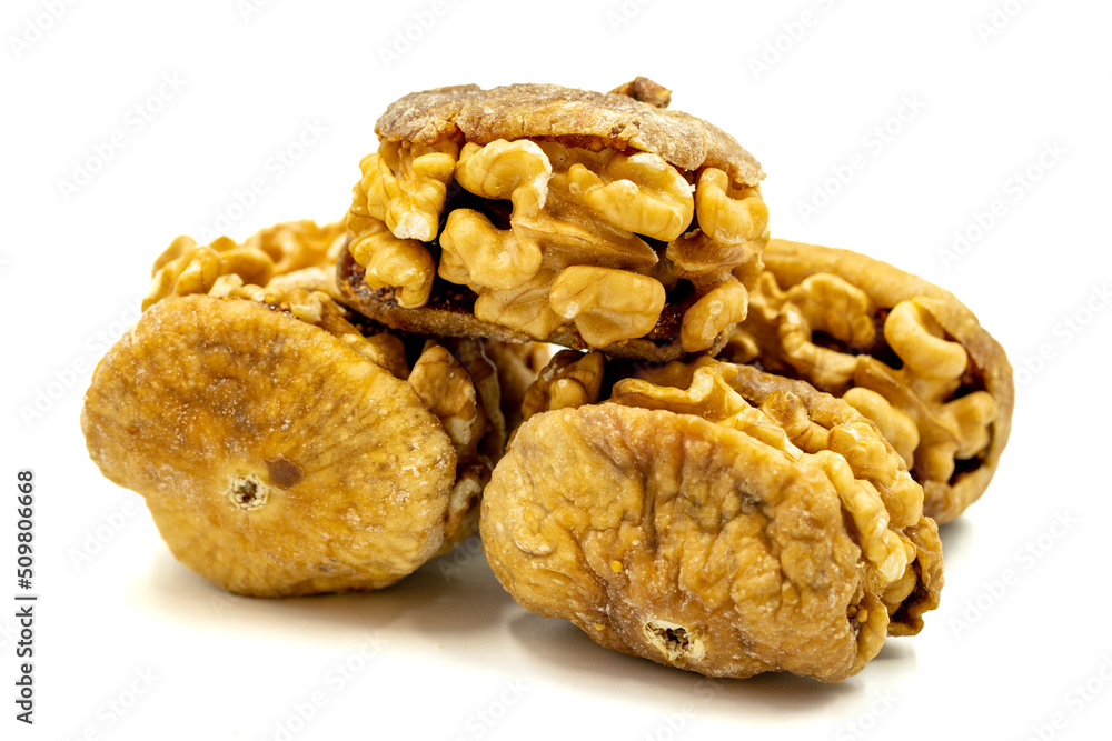 Stuffed dried figs. Dried figs stuffed with walnuts isolated on white background. Close-up. local name cevizli incir Stuffed dried figs. Dried figs stuffed with walnuts isolated on white background. Close-up. local name cevizli incir