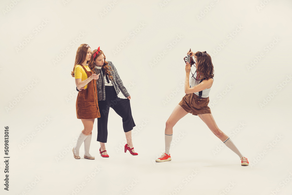 Pretty Young Girls in Retro 70s, 80s, 90s Fashion Style, Outfits Isolated  Over White Studio Background. Concept of Eras Stock Photo - Image of clothes,  dress: 254474508