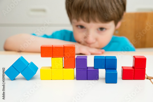 Canvas Print Wooden colorful blocks similar to popular ‎tile-matching puzzle game