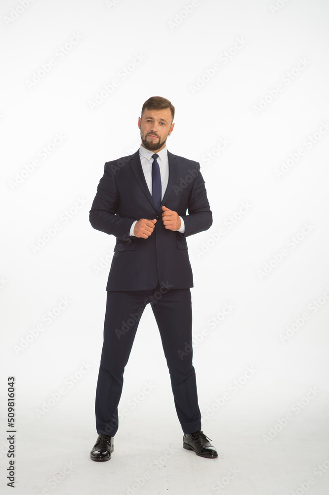 young businessman in a suit posing with different emotions on a white background in the studio isolated in full growth young businessman in a suit posing with different emotions on a white background in the studio isolated in full growth