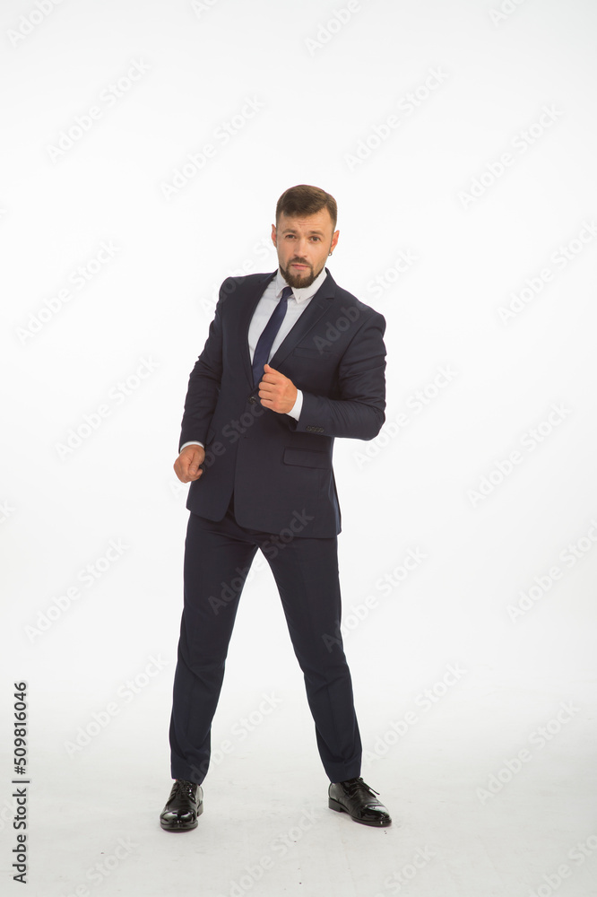 young businessman in a suit posing with different emotions on a white background in the studio isolated in full growth young businessman in a suit posing with different emotions on a white background in the studio isolated in full growth