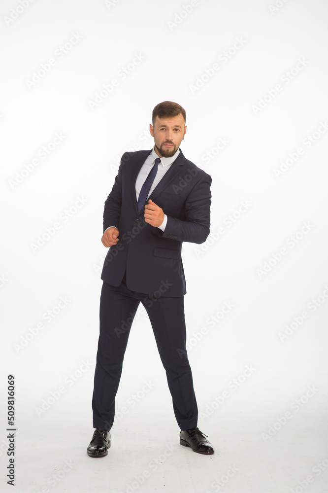 young businessman in a suit posing with different emotions on a white background in the studio isolated in full growth young businessman in a suit posing with different emotions on a white background in the studio isolated in full growth