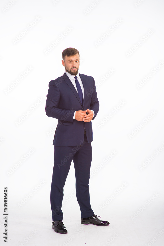 young businessman in a suit posing with different emotions on a white background in the studio isolated in full growth young businessman in a suit posing with different emotions on a white background in the studio isolated in full growth
