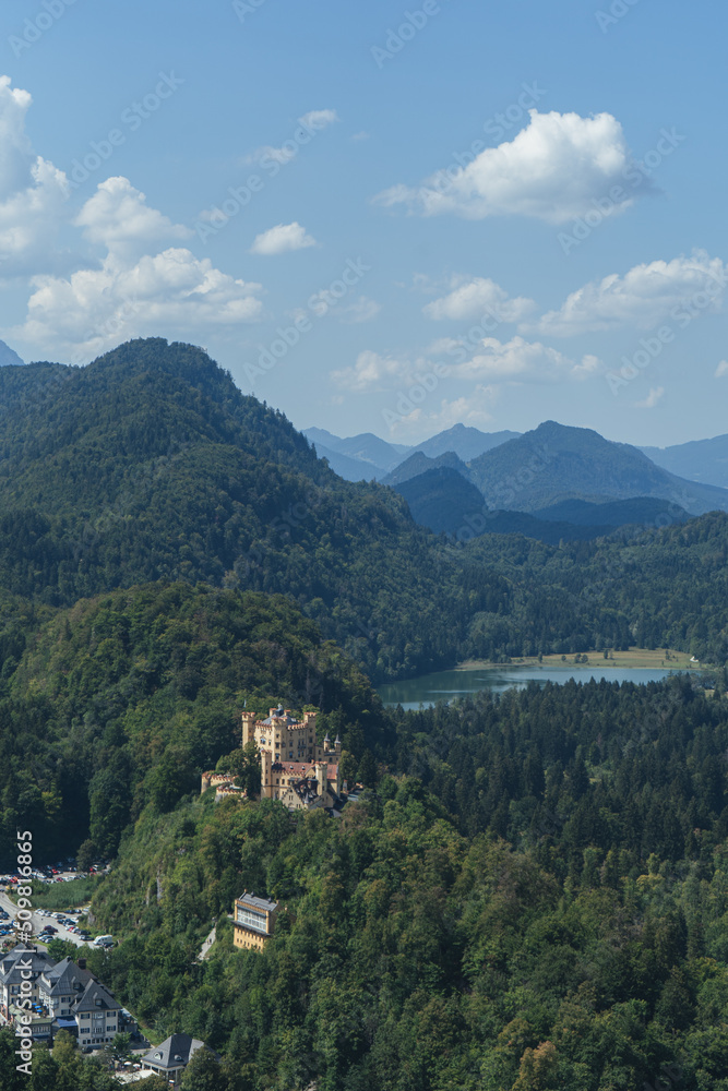 Castle in the mountains, Bavaria Alps with castle, Beautiful view in Alps in summer, Neuschwanstein castle view, View from above to the castle, View in Bavaria Alps from the top, Mountains and Castle