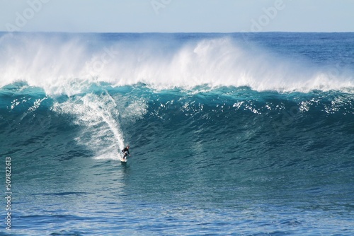 Photography Big Wave Surfer in Australia in a perfect blue day