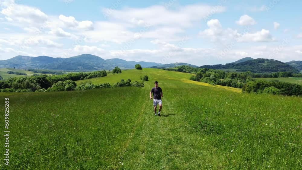Active, healthy and brown-haired athlete improves his explosive and speed power with short uphill sprints. Sunny weather. 4k video Active, healthy and brown-haired athlete improves his explosive and speed power with short uphill sprints. Sunny weather. 4k video