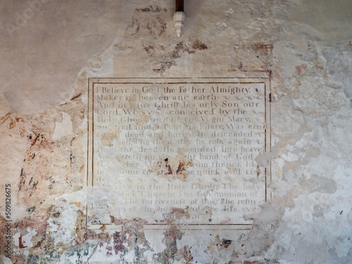 Ancient wall art, creed in St. John The Baptist church at Inglesham, Wiltshire, an ancient unmodernised small church near Lechlade, UK.