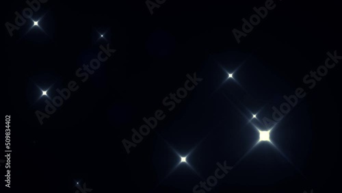 Animated dark blue and white sparkles like stars in the night.