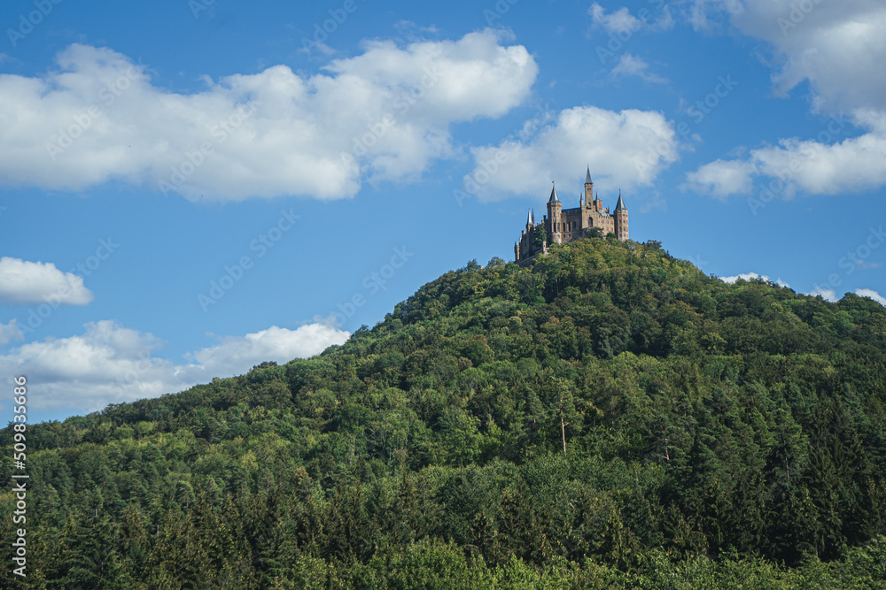 Castle in the mountains, Hohenzollern castle in Germany, panorama landscape of the castle in Germany, German Castle view on the top of the mountains, panorama view with Broun Castle on the hill