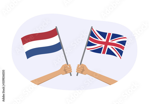 The Netherlands and UK flags. British and Dutch national symbols. Hand holding waving flag. Vector illustration.