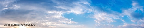 Panorama sky with cloud on a sunny day. Beautiful cirrus cloud.. © tanarch