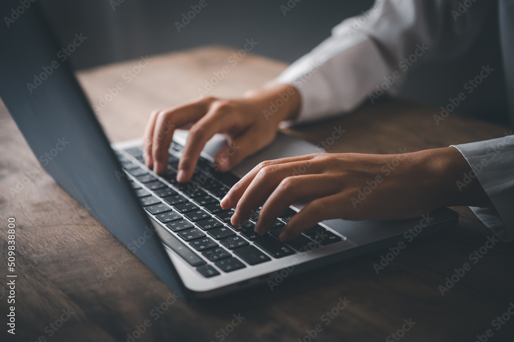 Woman hands typing on laptop keyboard closeup , student girl using laptop at home, online learning, internet marketing, working from home, office workplace freelance concept Woman hands typing on laptop keyboard closeup , student girl using laptop at home, online learning, internet marketing, working from home, office workplace freelance concept