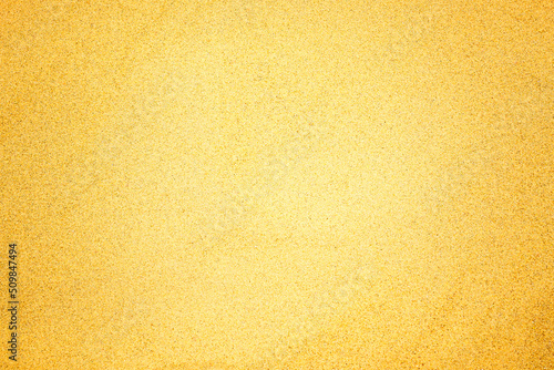 Vászonkép Bright yellow sand texture background
