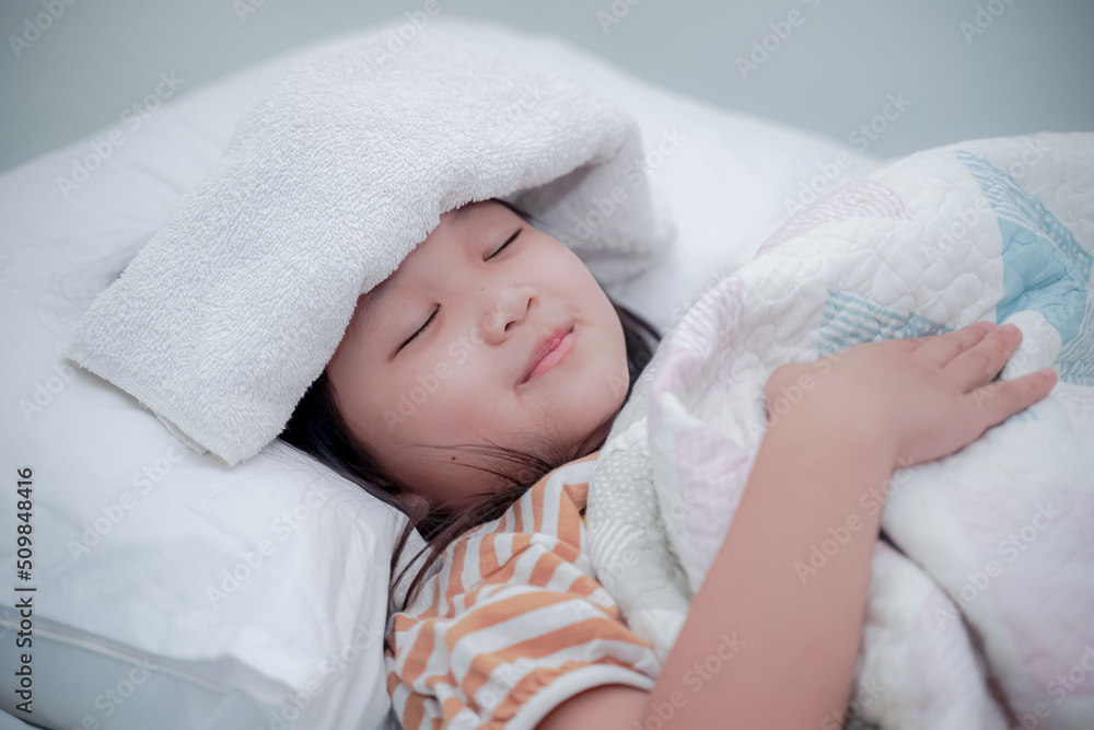 Coronavirus Covid-19 pm2.5.Online education.Little asian girl wearing face mask show thumbs up for good and happy at home. Covid-19 coronavirus.Stay home.Social distancing.New normal behavior. Coronavirus Covid-19 pm2.5.Online education.Little asian girl wearing face mask show thumbs up for good and happy at home. Covid-19 coronavirus.Stay home.Social distancing.New normal behavior.