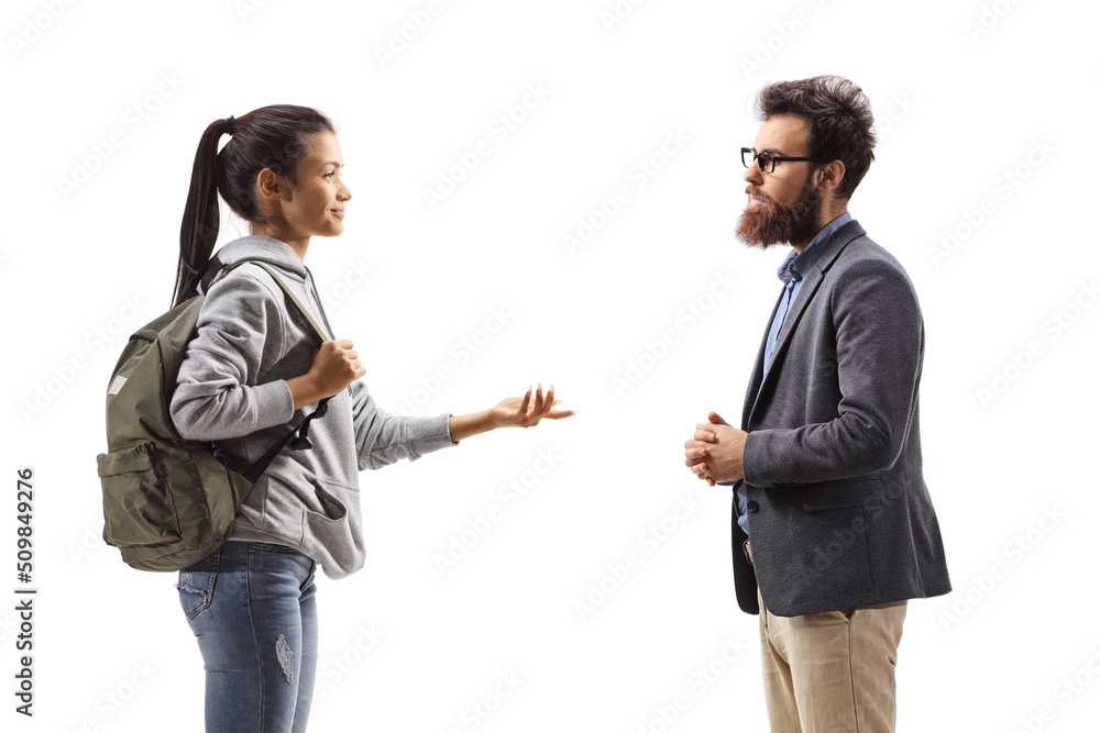 Profile shot of a female student talking to a bearded man Profile shot of a female student talking to a bearded man