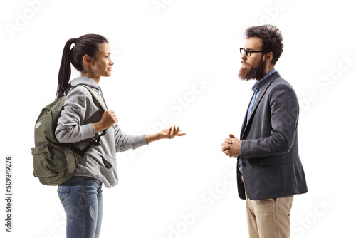 Profile shot of a female student talking to a bearded man