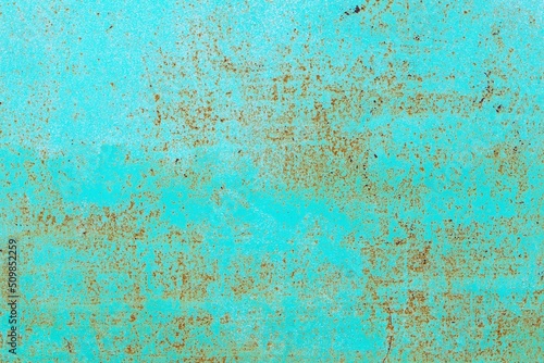 texture, background painted metal surface of green color with rust spots appearing