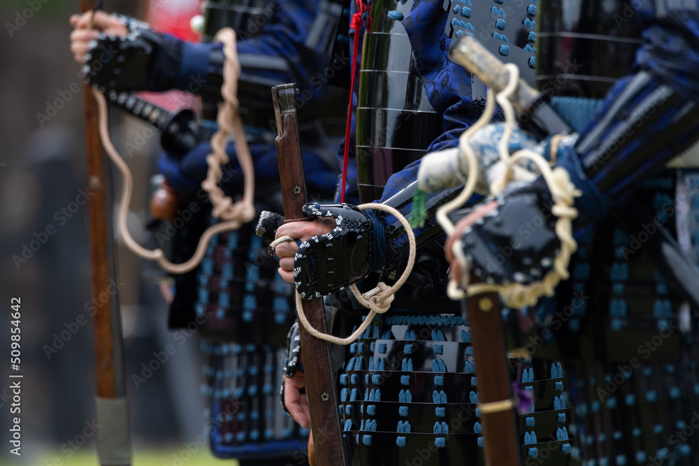 火縄銃を構えた鎧武者 StockFoto Adobe Stock