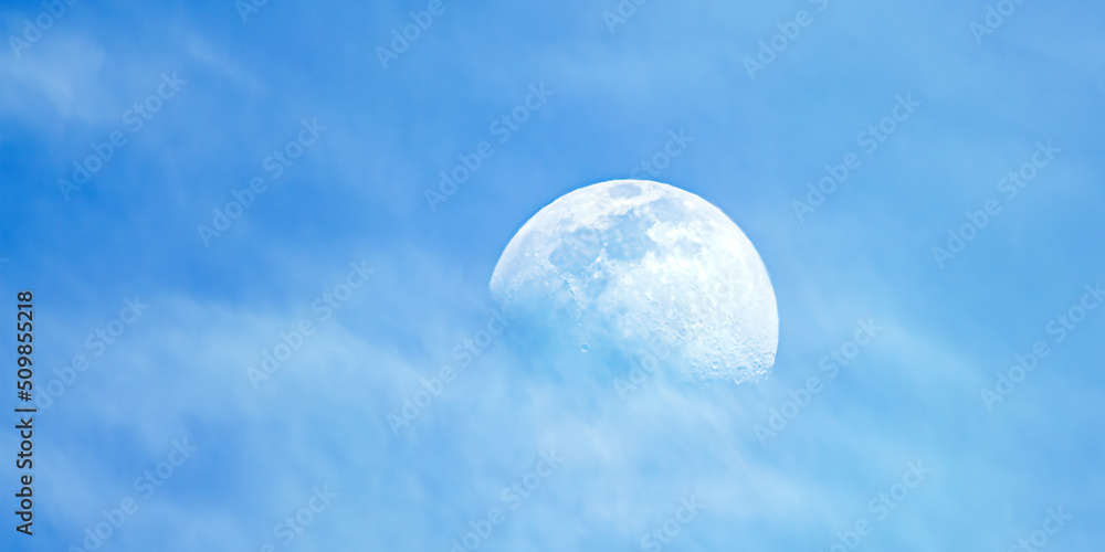 Moon seems to be floating on a Sea of Clouds. Blue clouds, Full Moon and White Clouds.