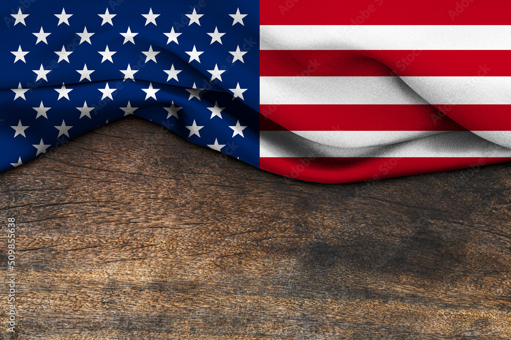 Obraz premium American flag wave on wood background