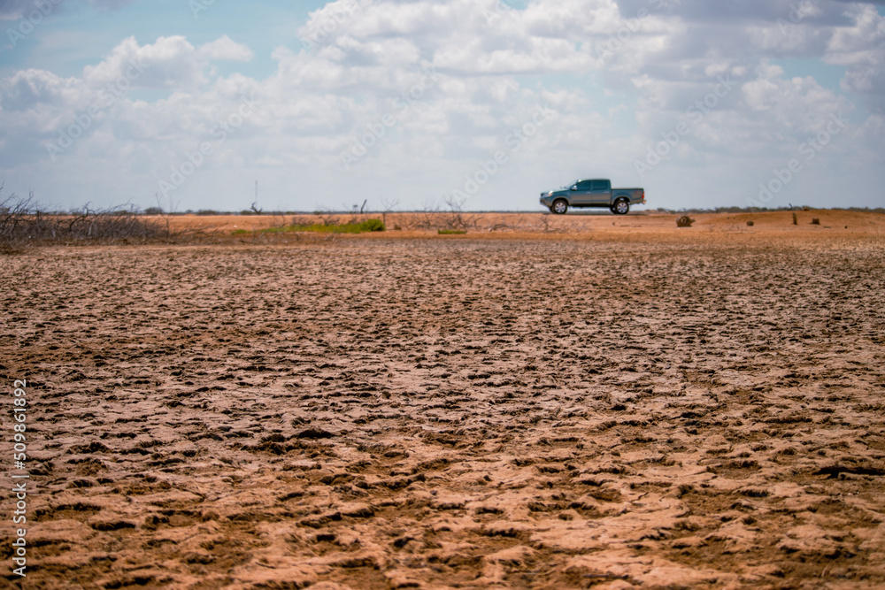 Fototapeta premium tractor in dry field