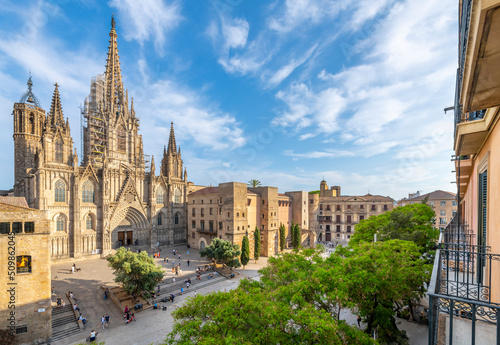 View from a balcony of the Gothic Barcelona Cathedral of the Holy Cross and Saint Eulalia and the plaza in the El Born district of Barcelona. photo