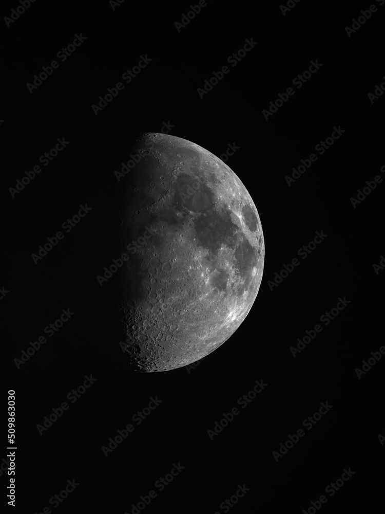 Waxing Gibbous moon in dark black space Waxing Gibbous moon in dark black space