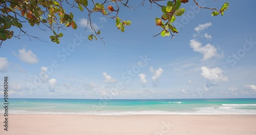 Phuket tropical beach, with blue sky, on a sunny day in the summer sea of Thailand. Empty sea with blue sky, during the summer season at Karon beach Phuket, Thailand.