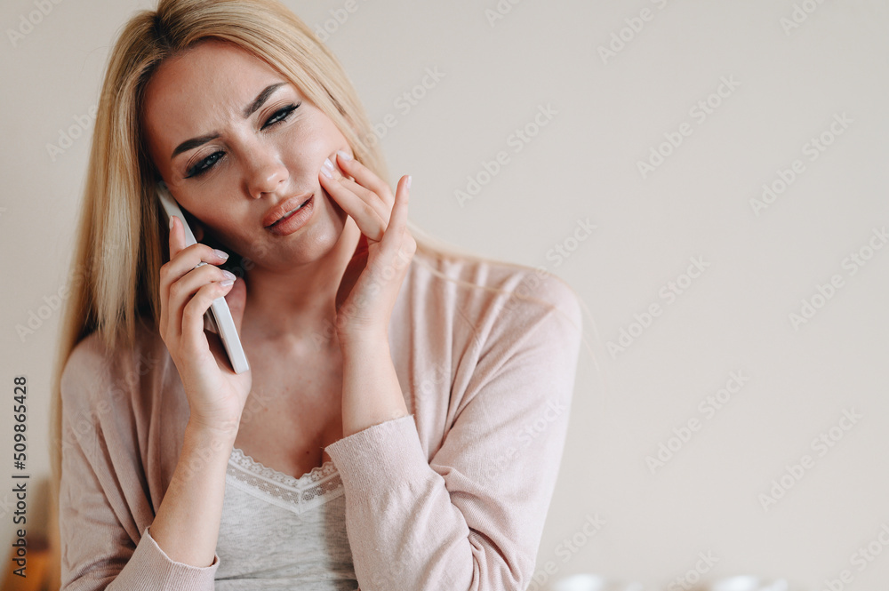 Girl calls Dentist. Portrait of Girl Hand on Cheek Girl calls Dentist. Portrait of Girl Hand on Cheek