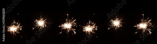 Silvester  New Year s Eve 2023 Party  New year  Fireworks  Firework background banner panorama long- Burning sparkling sparklers on dark night sky