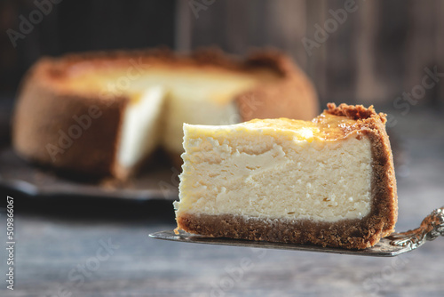 New York cheesecake is a dessert that is an open pie or even a cake. Decorated with strawberries. It consists of two main parts: sand base and cheese filling.