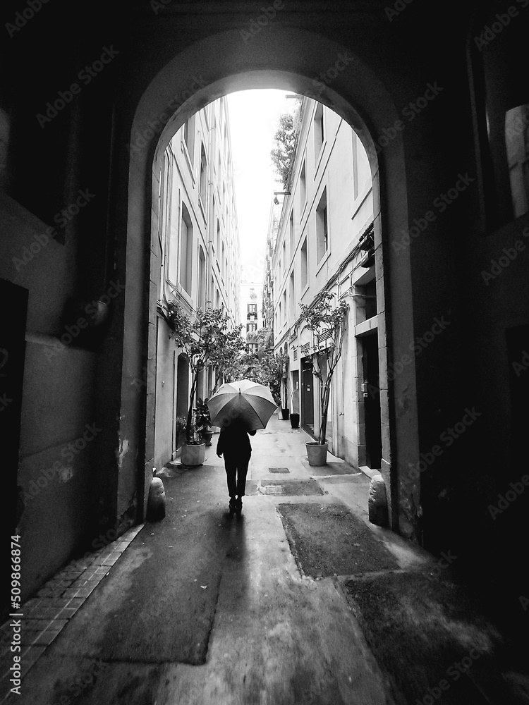 person walking in the rain