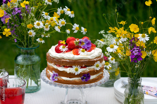 Scandinavian midsummer strawberry and cream cake photo