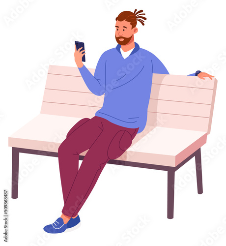 Young an sit on bench with smartphone. Urban lifestyle