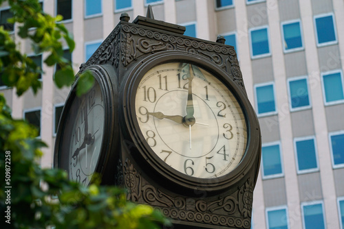 Nine o'clock on the urban city clock