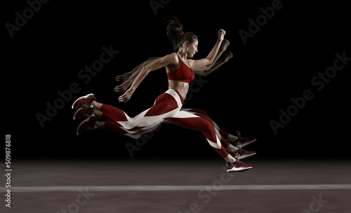 Sporty young woman running