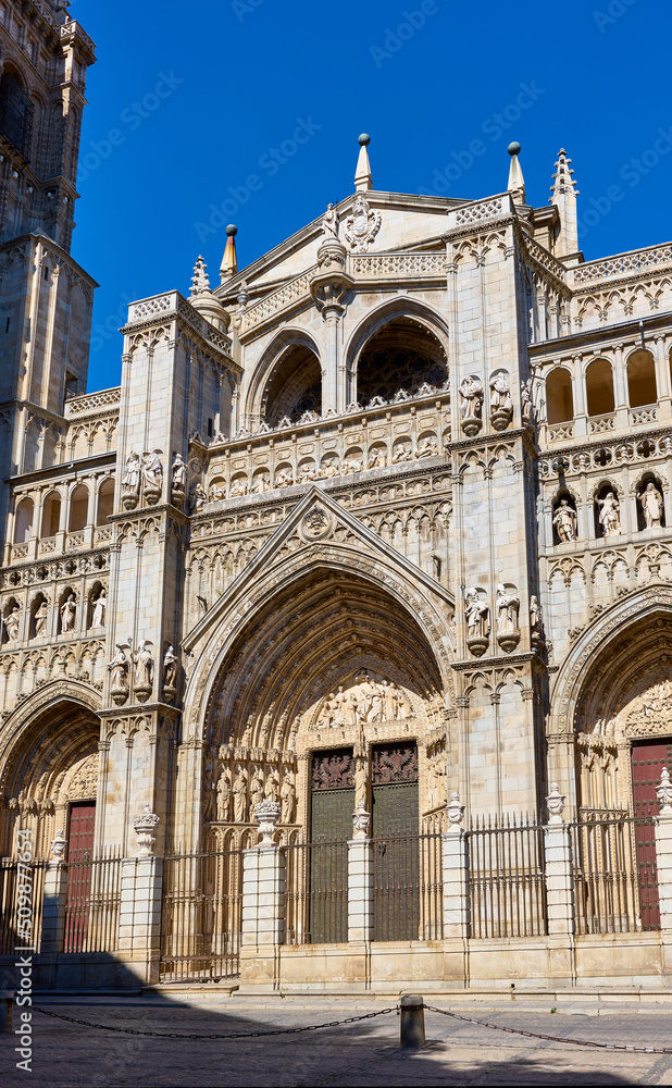 Puerta del Perdon Gate of the Toledo Prime Cathedral. View from Plaza del Ayuntamiento square. Toledo, Castilla La Mancha, Spain.