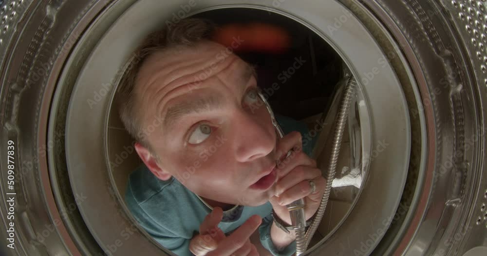 A man calls using a shower head from a washing machine. It emits a telephone conversation with a service repair. Emotional conversation. Rings on fingers. A man calls using a shower head from a washing machine. It emits a telephone conversation with a service repair. Emotional conversation. Rings on fingers.