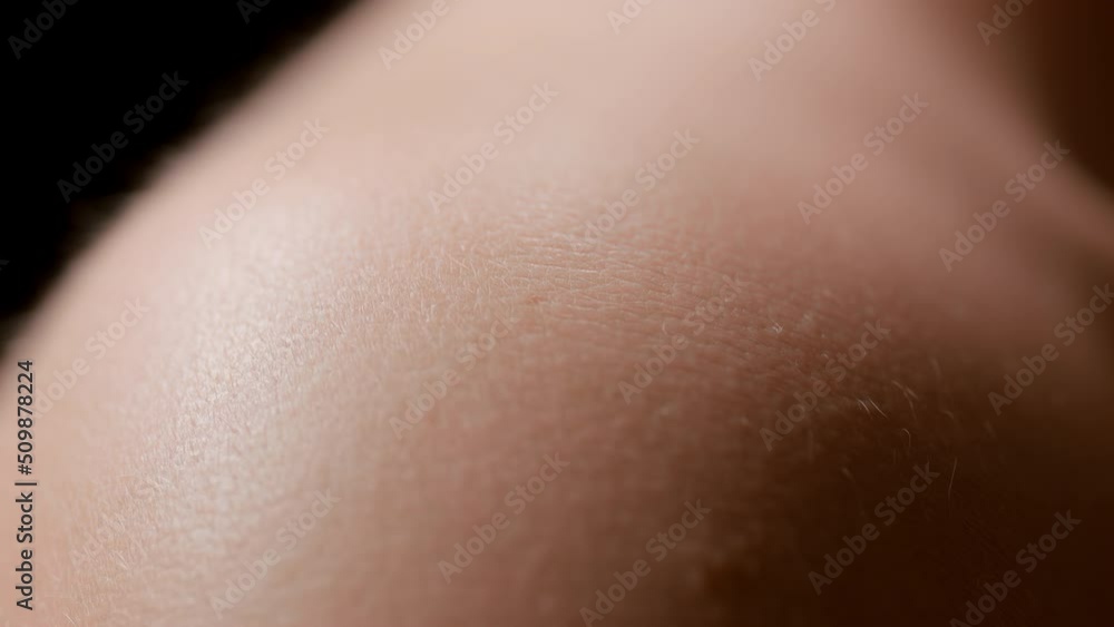 Macro shot of white pure smooth good-looking healthy skin of female model | Skin texture shot for moisturizer commercial Macro shot of white pure smooth good-looking healthy skin of female model | Skin texture shot for moisturizer commercial