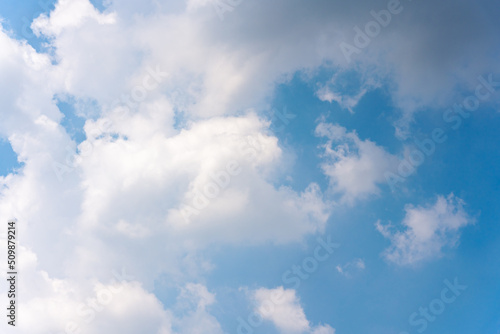 White clouds on blue sky in sunny day