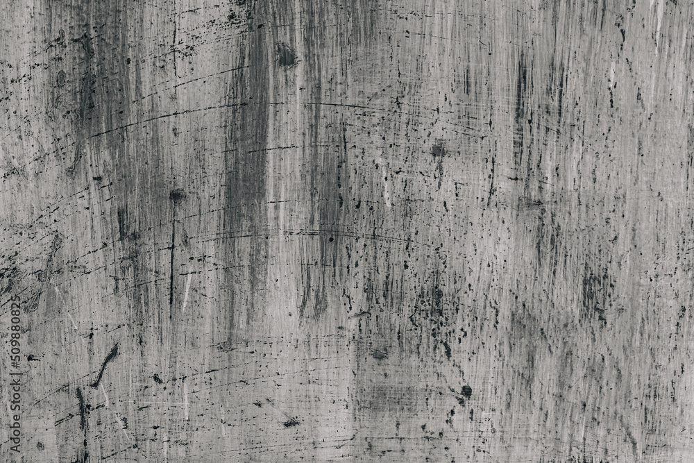 Grunge abstract beautiful monochrome black and gray wall with cracks and splashed black paint on plaster. Background with space for text or image. The art of rough stylized texture.