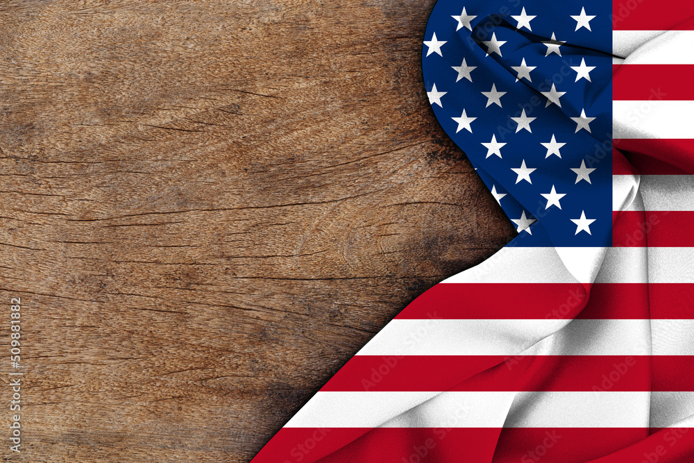 Obraz premium American flag wave on wood background