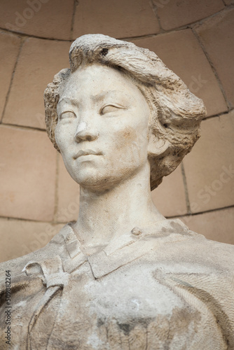 Wallpaper Mural Sculpture stone female head. Short hair.
 Torontodigital.ca